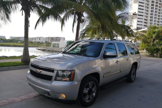 Private luxury transportation from CUN Airport to Playa del Carmen - Finding your driver after customs, and the lollipop name trick