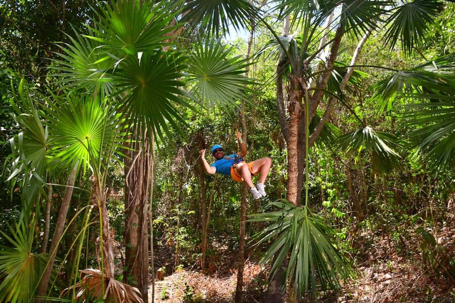 Rio Secreto Nature Reserve: Bicycle, Rappel & Ziplines Tour - Three ziplines through the trees, with real staff energy
