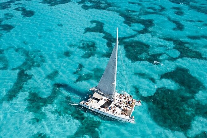 Sail Away Catamaran Day Trip with Snorkeling to Isla Mujeres - Snorkeling at Arrecife El Meco, 30 Minutes That Actually Matters
