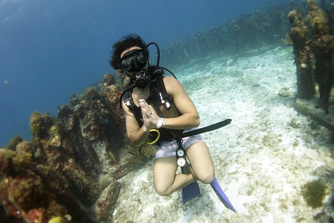 Scuba diving at MUSA the underwater museum for certified divers - Why MUSA and Manchones belong on your Isla Mujeres plan