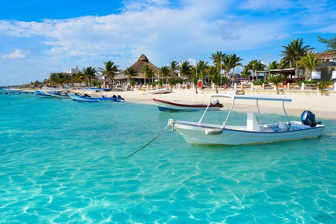 Snorkel in the turquoise Caribbean Sea in Puerto Morelos. Transport included - Beach club lunch and Puerto Morelos walking time