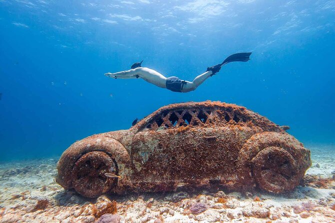 Snorkeling in Isla Mujeres and Underwater Museum - Beach club time and the roast fish Tikinxic lunch