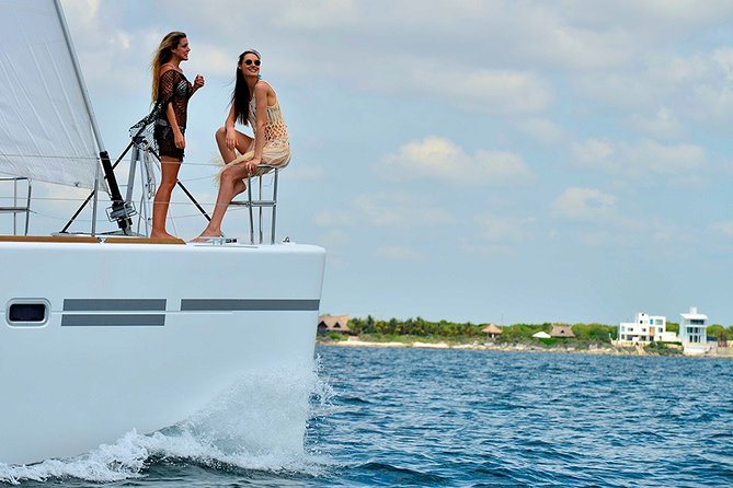 Special offer COMBO 2x1 (Tour to Isla Mujeres and Chichén Itzá ) for 1 price! - Day 1 on Isla Mujeres: catamaran sailing, reef snorkeling, and open bar