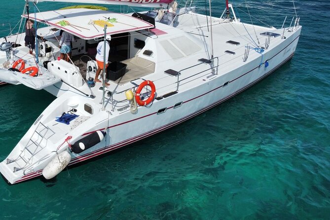 Splendid Isla Mujeres Catamaran: drinks and fun all day! - Arrecife El Meco Reef snorkeling: safe setup and real sea life