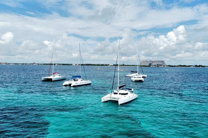 Splendid Isla Mujeres Catamaran: drinks and fun all day! - Sailing time, snacks, and the floating-party rhythm