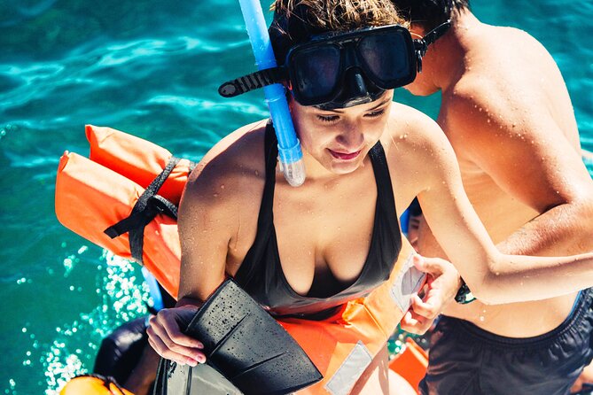The Best Catamaran tour to Isla Mujeres with Open Bar and Lunch - The reef stop for snorkeling, 30 minutes of see-it-now water time