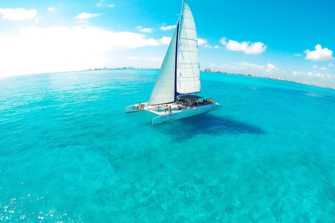 Tour in a Catamaran to Isla Mujeres with all included for the best price! - Reef snorkeling: included equipment, short session, strict age limits