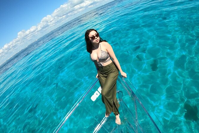 Tour Isla Mujeres excursion in Collective Transparent Boat - Timing Matters on Isla Mujeres: Why the Early Boat Often Wins
