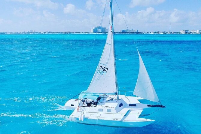Trip to Isla Mujeres by Catamaran, with snorkeling and drinks - A Catamaran Day Trip From Cancun To Isla Mujeres
