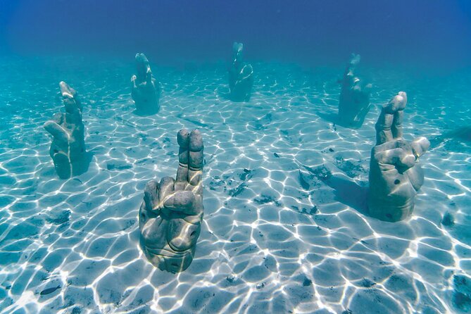 Trip to Isla Mujeres by Catamaran, with snorkeling and drinks - Snorkeling stop: what you’re really signing up for