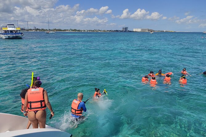 Trip to Isla Mujeres - Catamaran Unlimited Adventure from Playa del Carmen - The Onboard Vibe: Open Bar and the Tequila Party