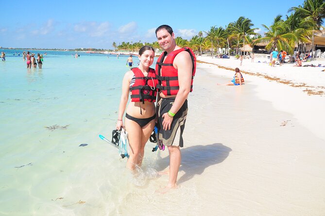 Tulum Ruins, Turtle Sighting and Underground Caves - Stop 1: Tulum Ruins on the cliff above turquoise water
