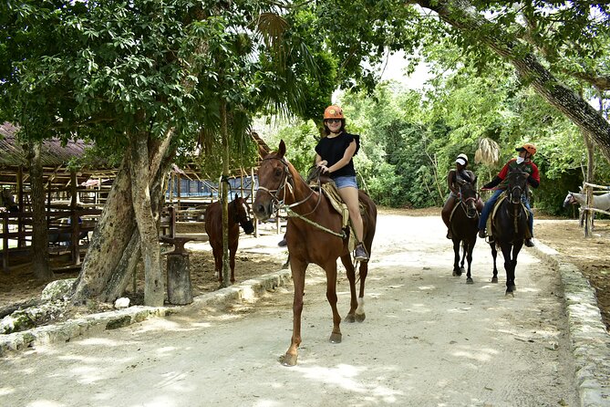 Wonderful Jungle Experience with Horse Riding, ATV, Ziplines and Cenote - Zipline over the trees: safe gear, phone rules, and a clear weight cap